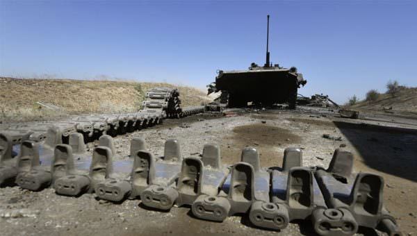 Askerin cesedi tellerde