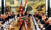 Ba�dat'la yeni d�nem 48 imza ile per�inlendi
