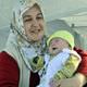 Evlat sevinci deprem ac�s�n� unutturdu